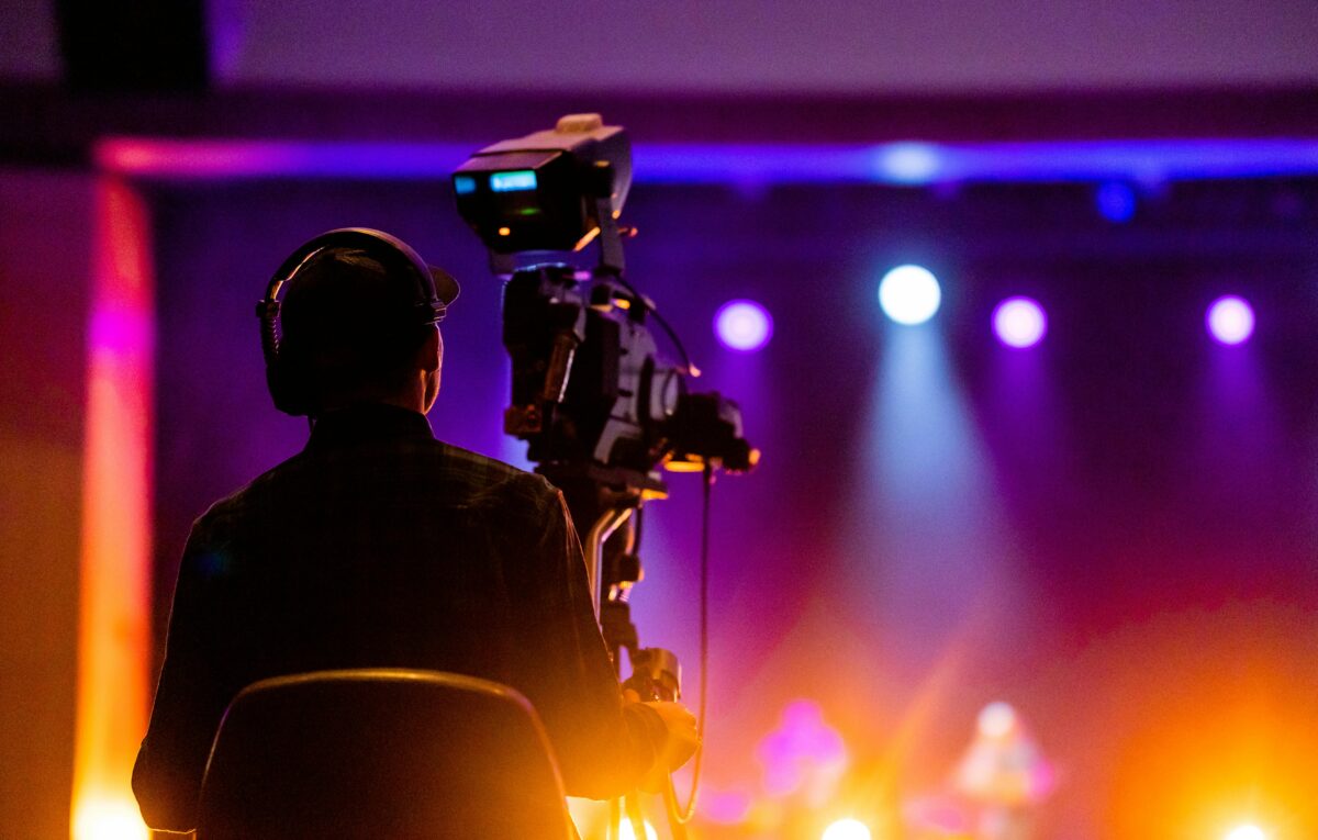 Professional photographer in Abu Dhabi covering a corporate event